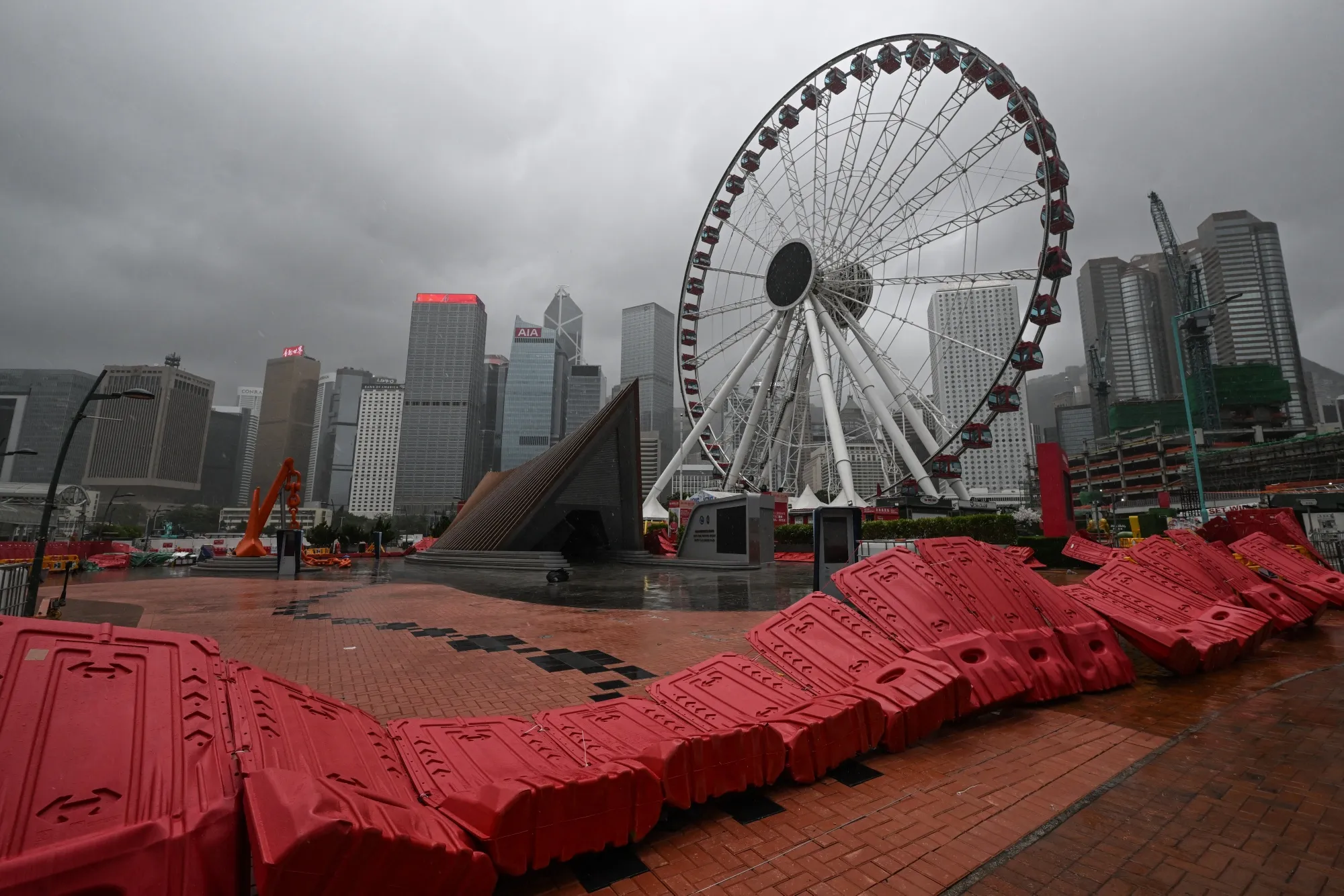 Barricades are blown down in the Central district as the typhoon signal number 10 in Hong Kong on July 20.