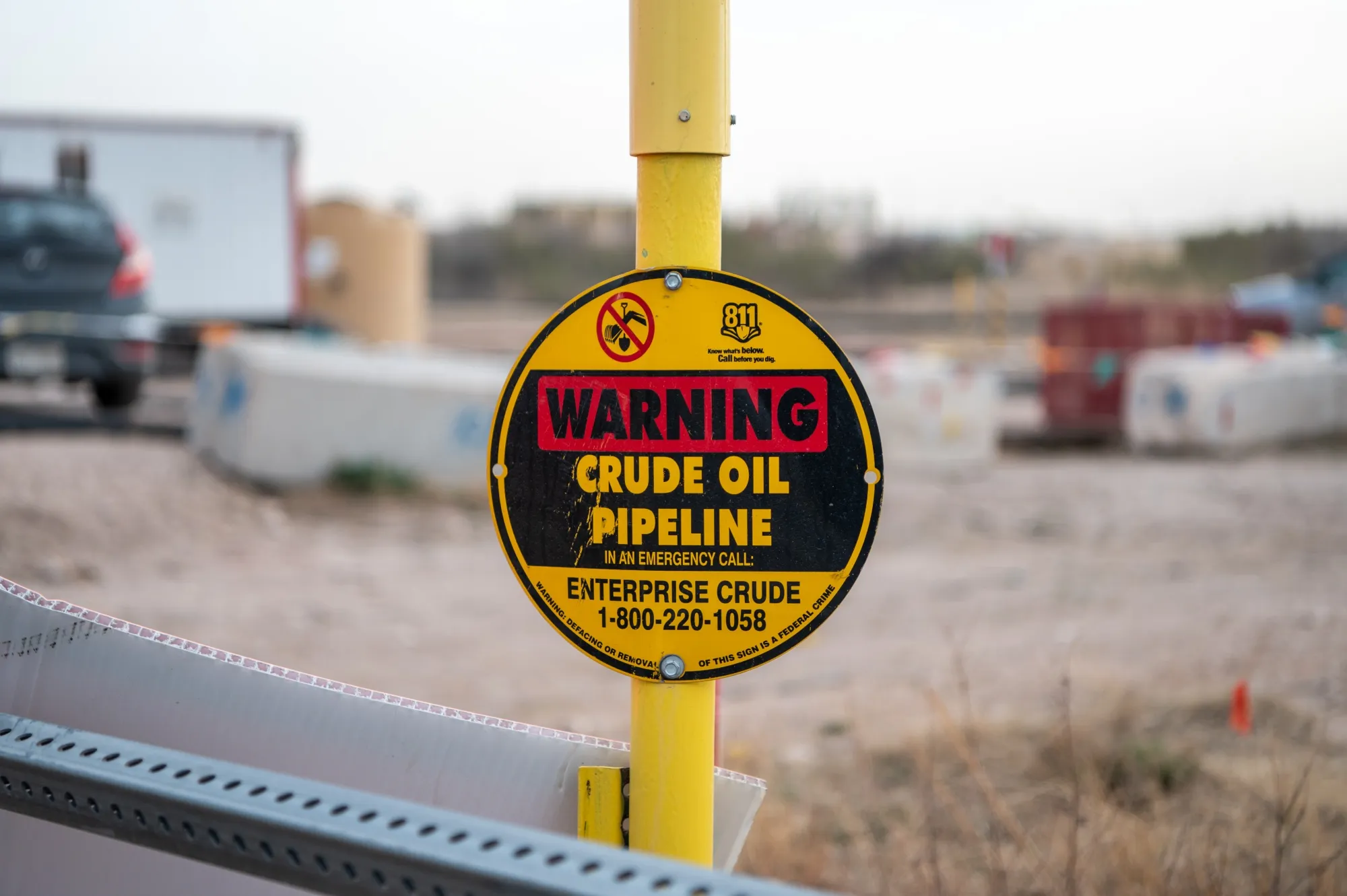 A&nbsp;sign near an oil drilling rig in Midland, Texas, on&nbsp;March 2, 2023.&nbsp;