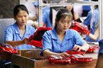 Workers on a production line at a toy factory in China