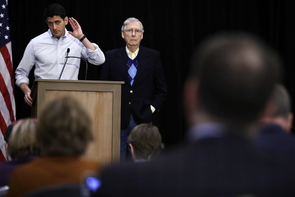 House Speaker Paul Ryan (R-Wisconsin) and Senate Majority Leader Mitch McConnell (R-Kentucky) field questions during a news conference at the GOP congressional retreat in Philadelphia on January 26.