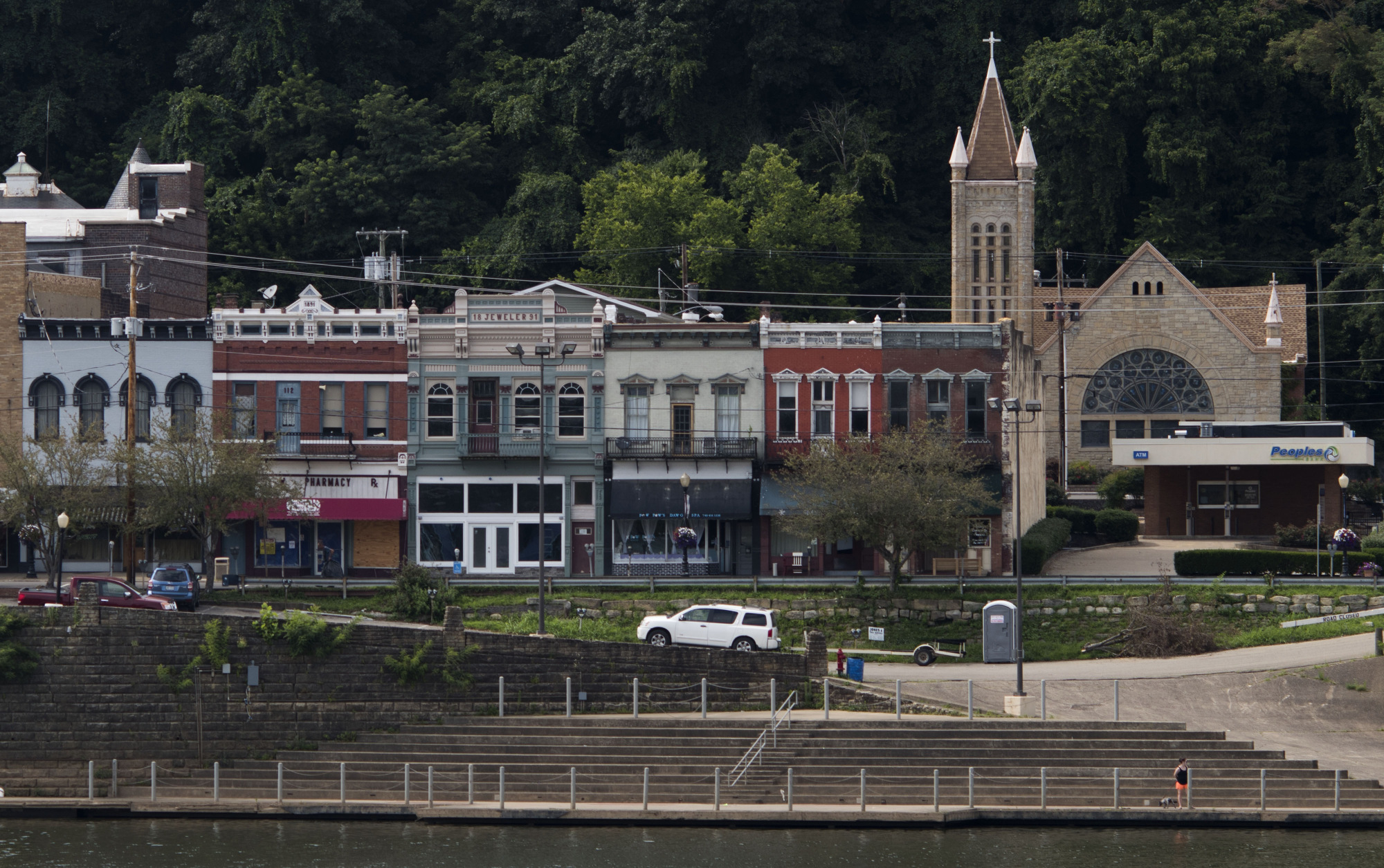 The Ohio River stands in front of businesses in Pomeroy, Ohio.&nbsp;
