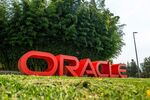 Signage is displayed outside the Oracle Corp. headquarters campus in Redwood City, California, U.S., on Tuesday, Aug. 18, 2020. 