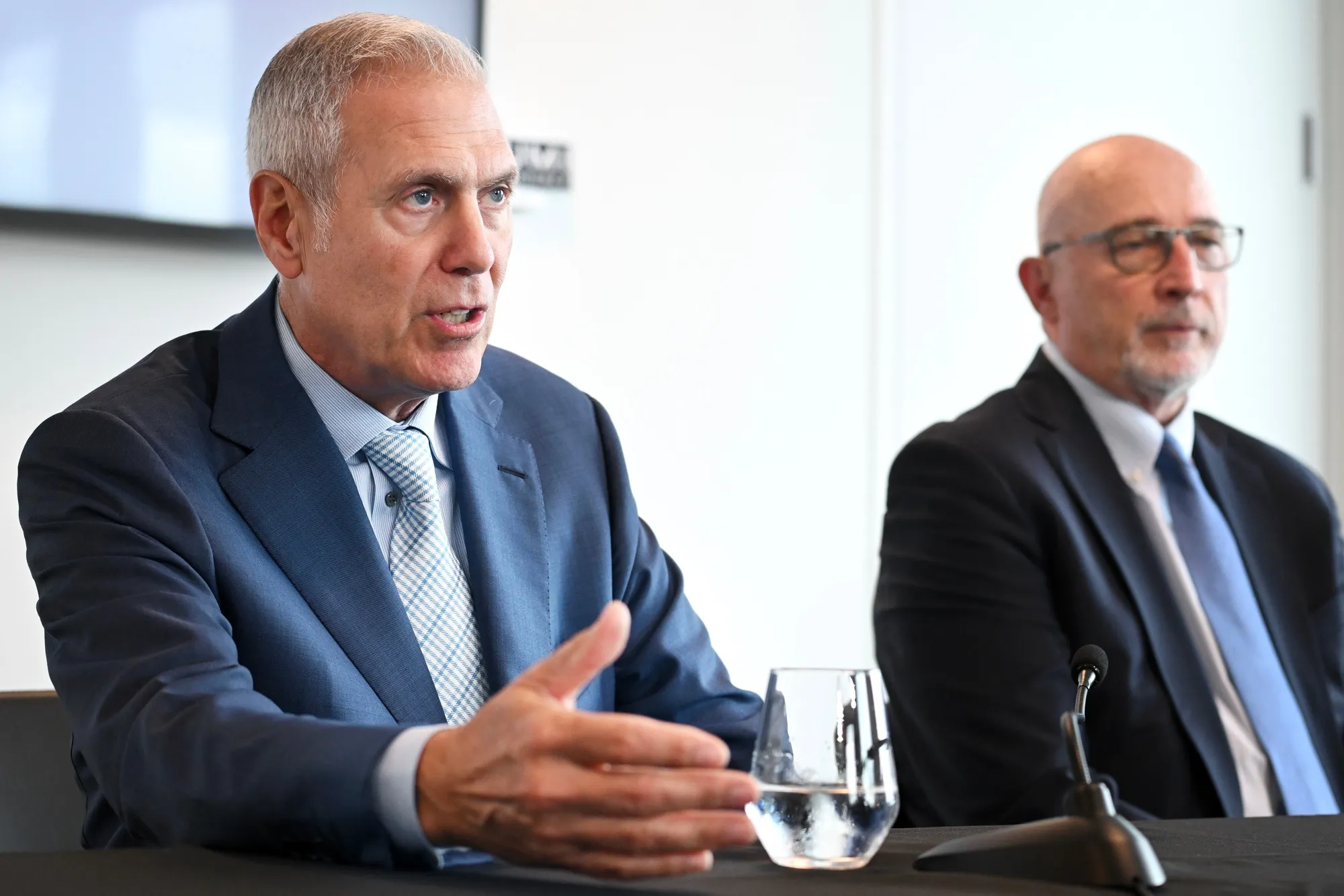 Glenn Chamandy and Michael Kneeland, chair of Gildan Activewear Inc., during a news conference&nbsp;in Montreal, Quebec, on May 28.