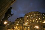 A bronze cast of an infantry soldier stands&nbsp;opposite the Bank of England in London.