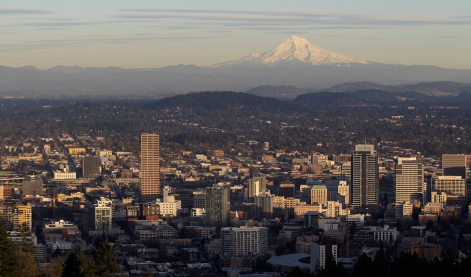 Portland, Oregon, with Mount Hood in the background. The Eliot Glacier on Mount Hood has been shrinking due to climate change.