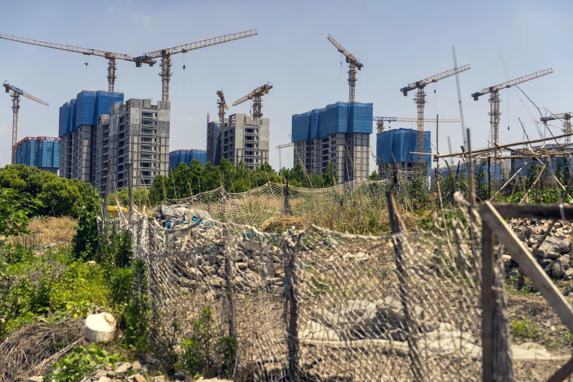 Residential buildings under construction at China Vanke's Langshi Flower Language development in Shanghai.
