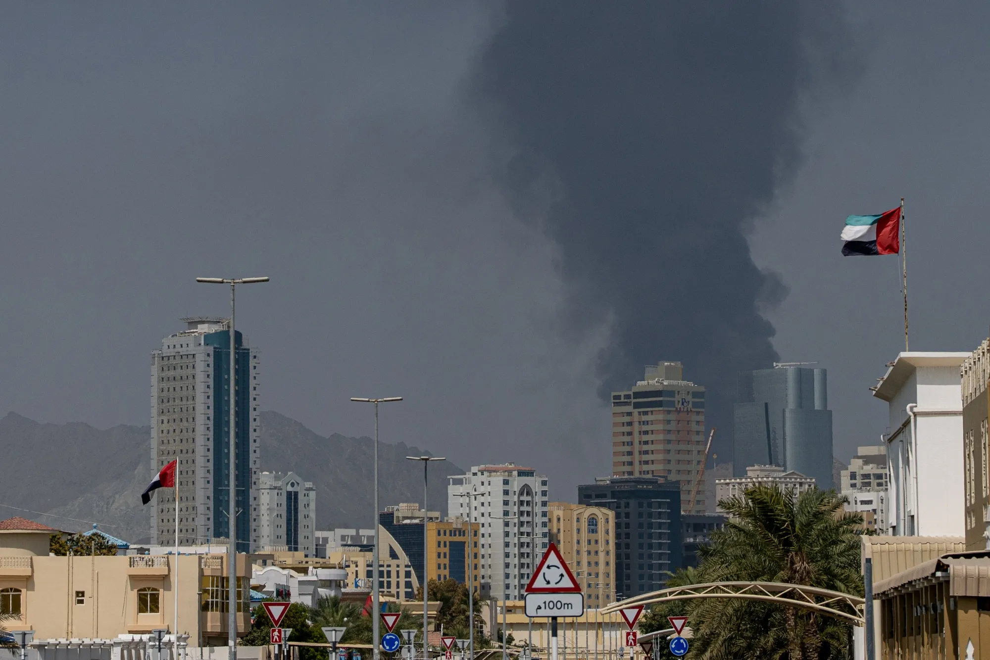 Smoke rises after an explosion in the industrial zone in Fujairah, United Arab Emirates, on Tuesday, March 3, 2026. Oil surged for a second day as the US and Israel stepped up their war against Iran, with a fire at a key storage hub in the United Arab Emirates underscoring the risk to energy supplies.