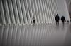 Pedestrians pass in front of the Oculus transportation hub in New York, U.S., on Wednesday, Feb. 26, 2020.