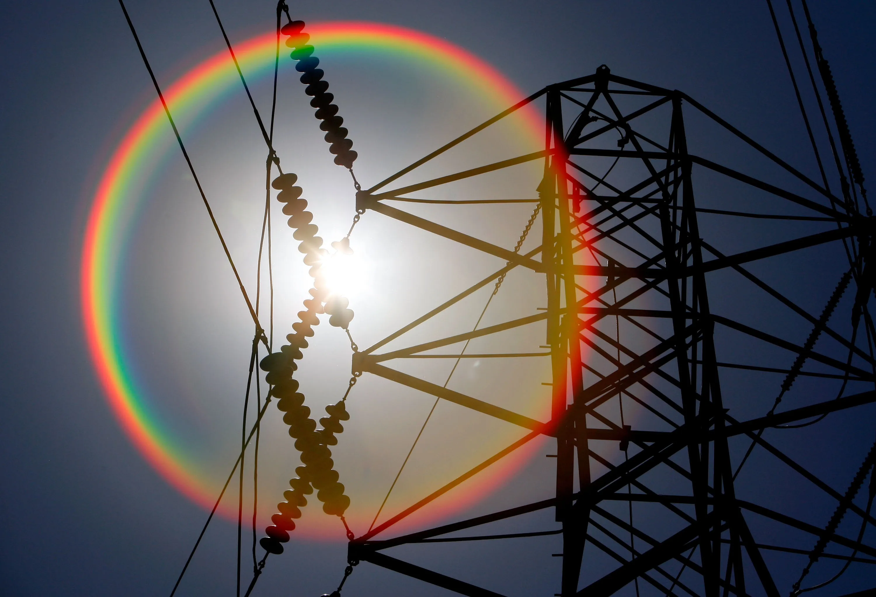 Sunshine&nbsp;over towers carrying electrical lines in San Francisco.