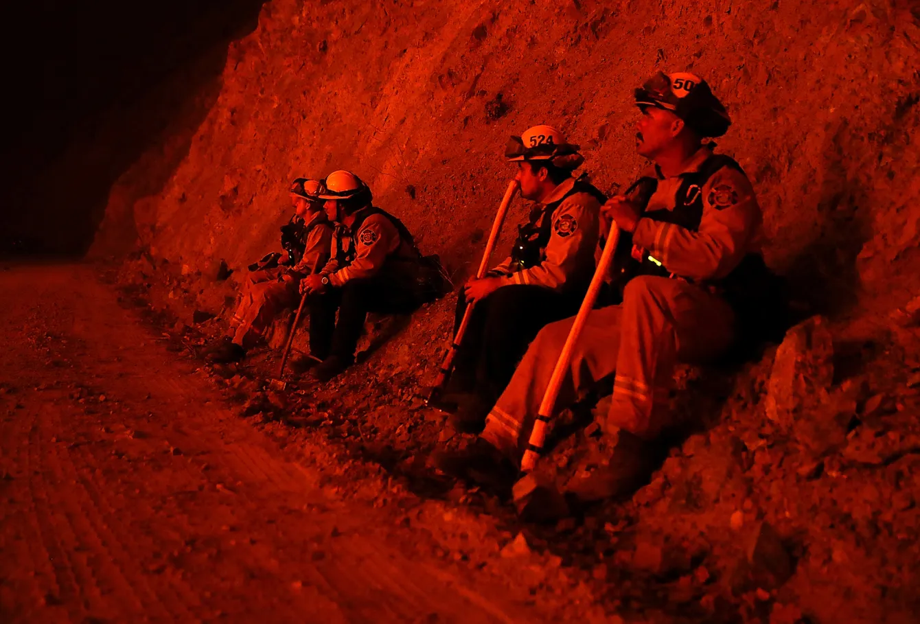 Firefighters monitor a back fire as they battle the Medocino Complex fire near&nbsp;Lodoga, California on Aug.&nbsp;7, 2018.
