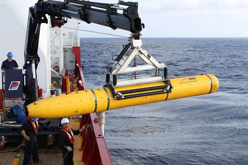Phoenix Autonomous Underwater Vehicle (AUV) Bluefin-21 is craned over the side of Australian Defence Vessel Ocean Shield in the search for missing Malaysia Airlines flight MH 370 in April 2014.