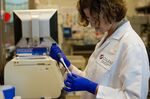 Maria Kovalenko, a scientist at Gilead Sciences Inc., analyzes patient antibody levels at the Gilead Sciences Inc. laboratory in Foster City, California, U.S..