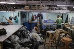 Workers in a garment workshop in the Dharavi area of Mumbai, India, on Jan. 5.