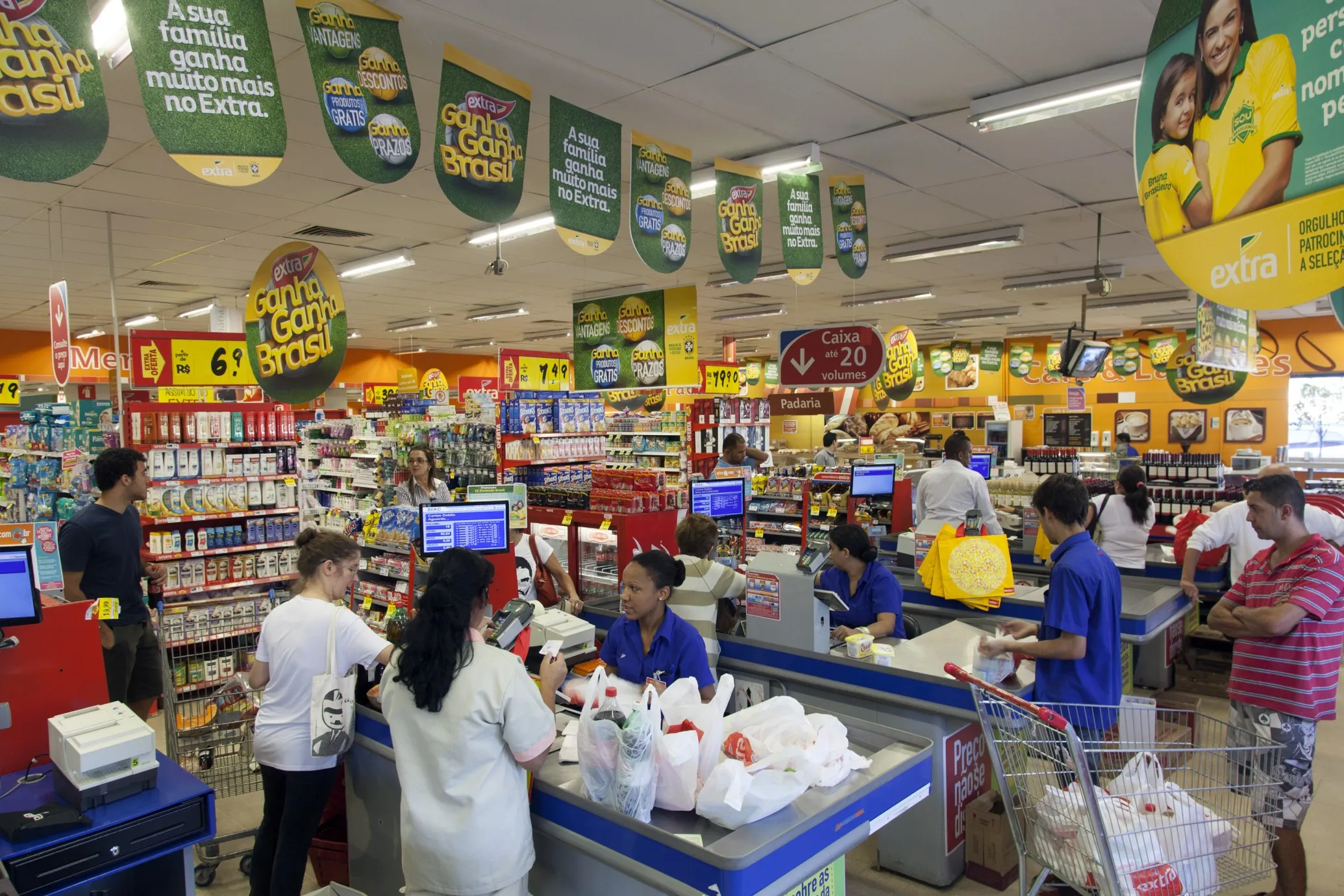 Shoppers check out at a supermarket in Brazil