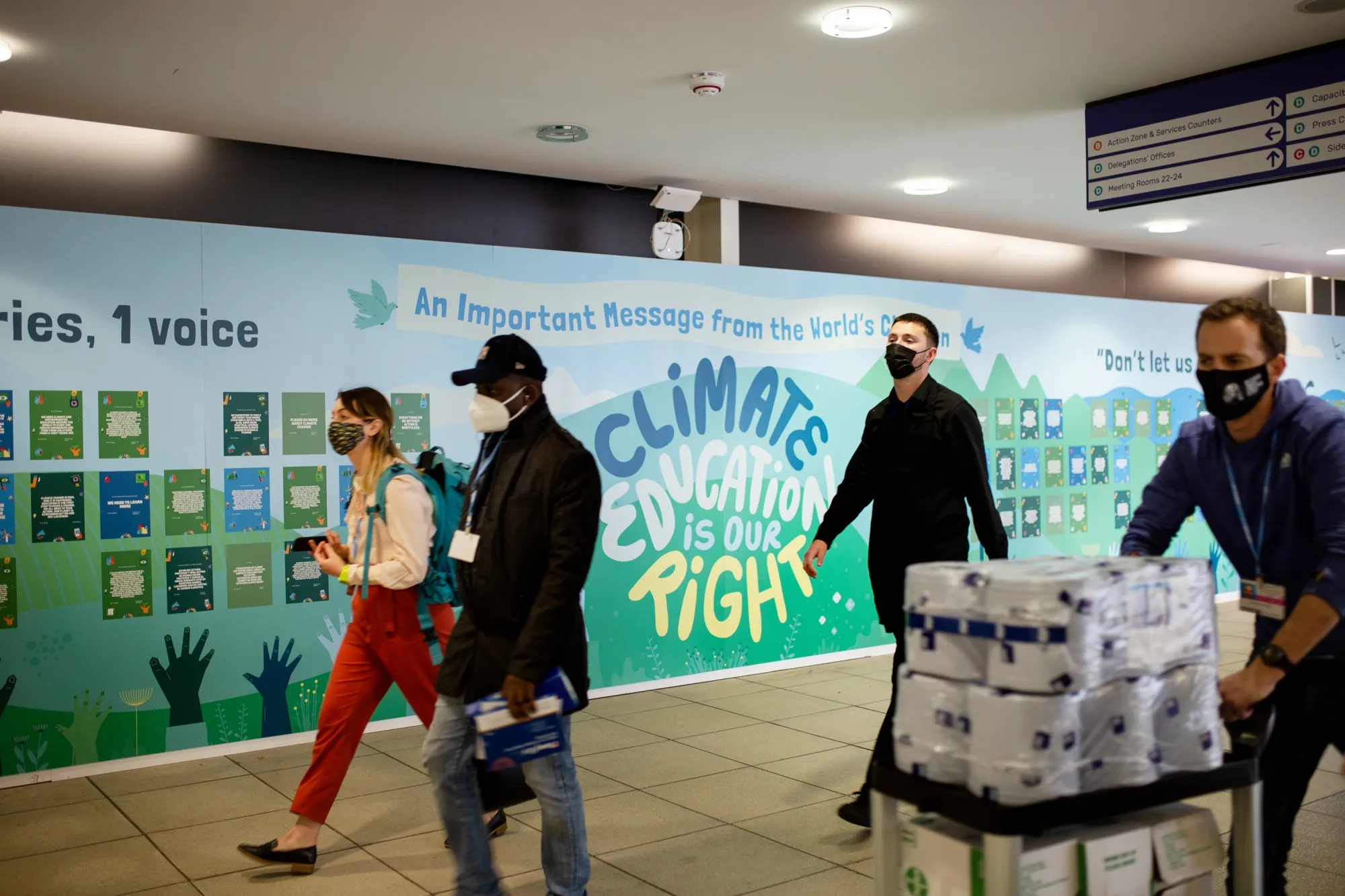 Visitors at the Blue Zone at the COP26 meeting in Glasgow yesterday.