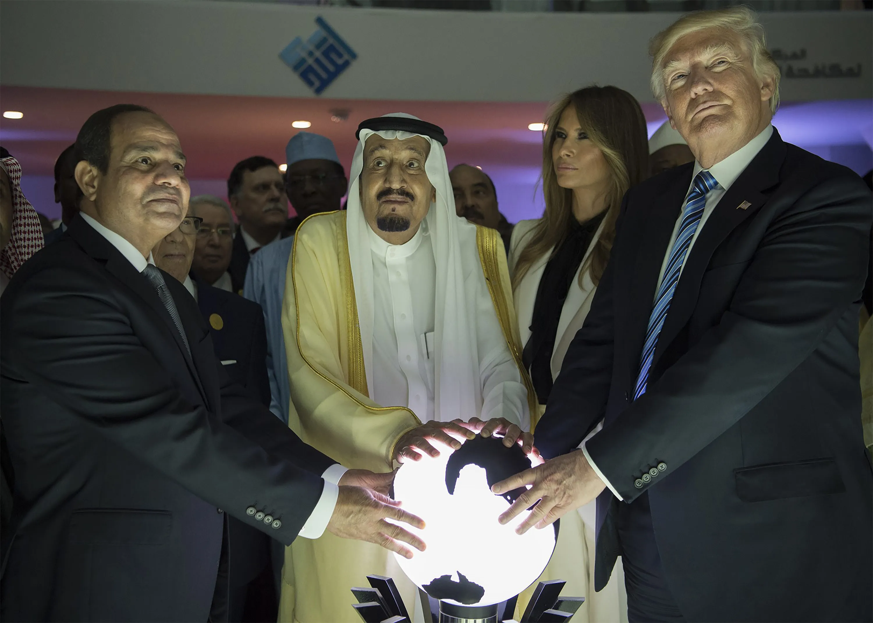 From left:&nbsp;Egyptian President Abdel Fattah el-Sisi, Saudi&nbsp;King Salman bin Abdulaziz al-Saud and&nbsp;President Donald Trump, place&nbsp;their hands on an illuminated globe in&nbsp;Riyadh on May 21, 2017.