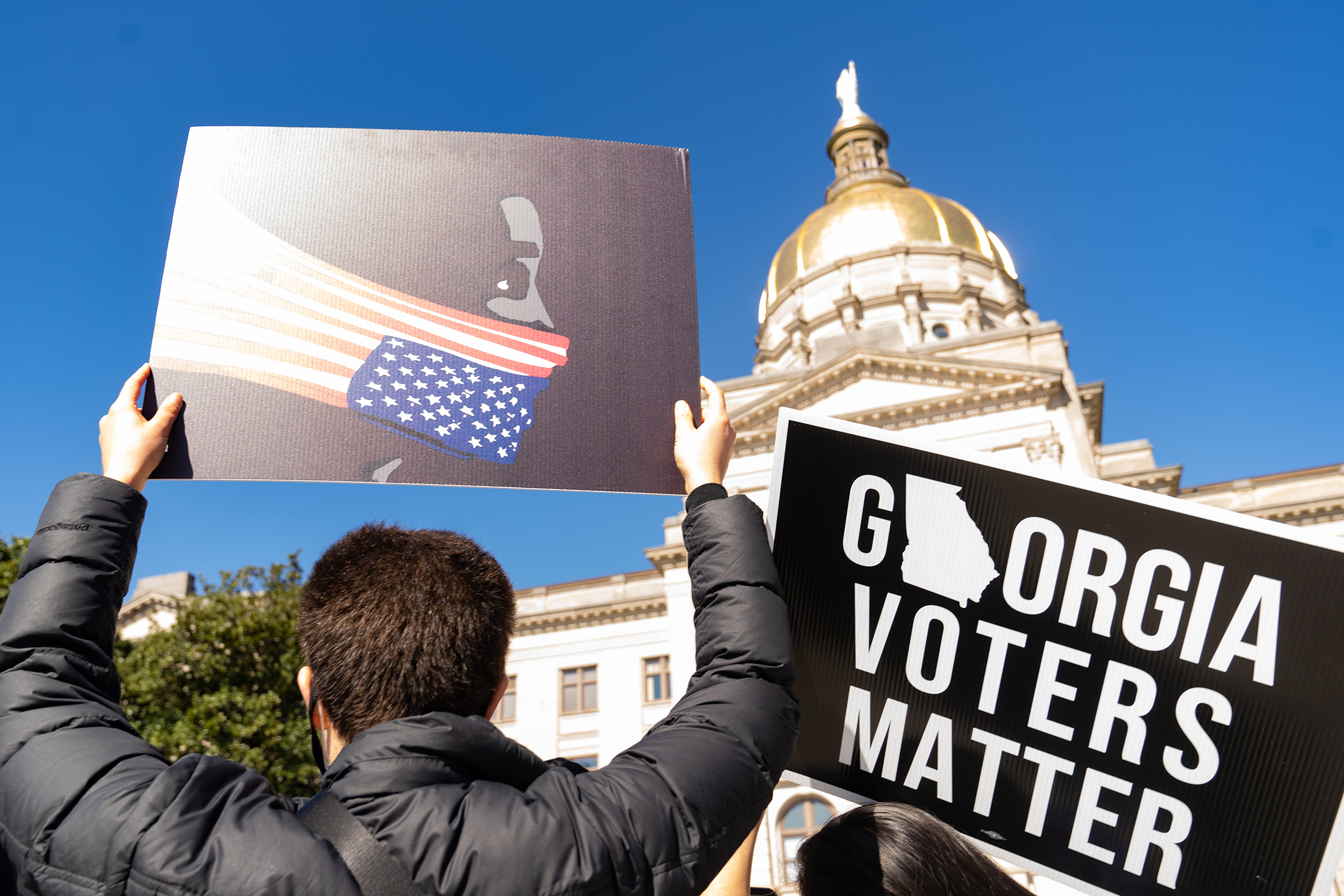 Demonstrators protest&nbsp;outside of the Georgia Capitol building&nbsp;to oppose a voting&nbsp;bill in Atlanta on March 3.