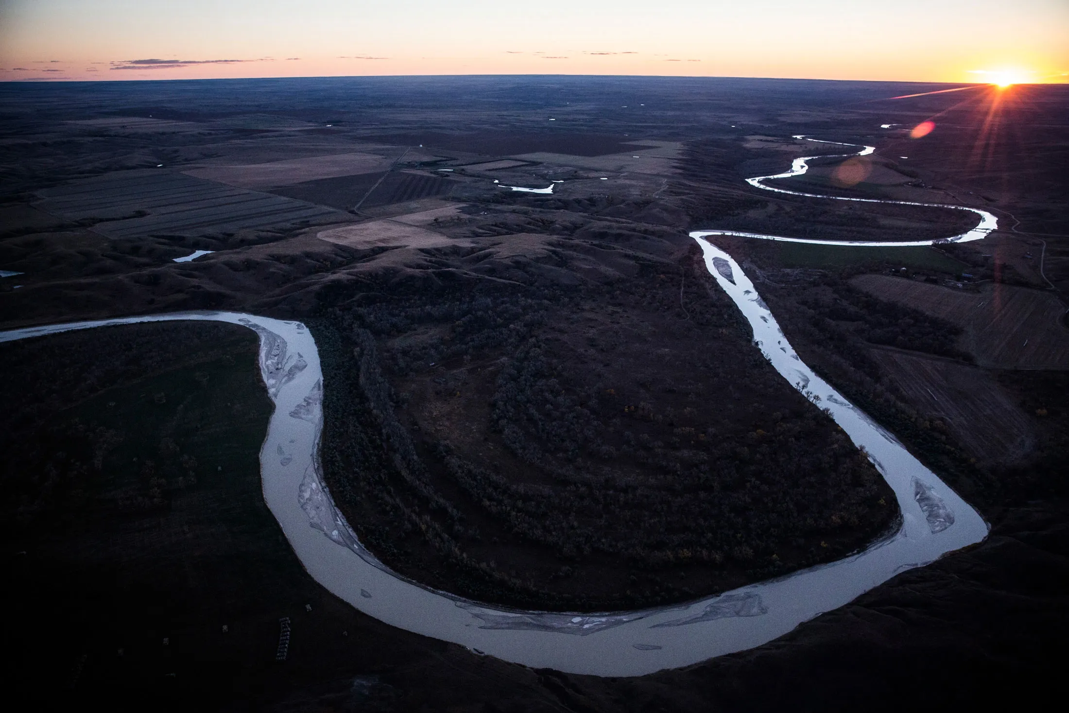 The White River weaves through the landscape near where the proposed Keystone XL pipeline would pass south of Presho, S.D.
