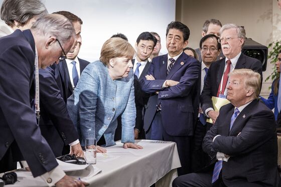 Trump Says He And Merkel Were Waiting on Communique in G-7 Photo