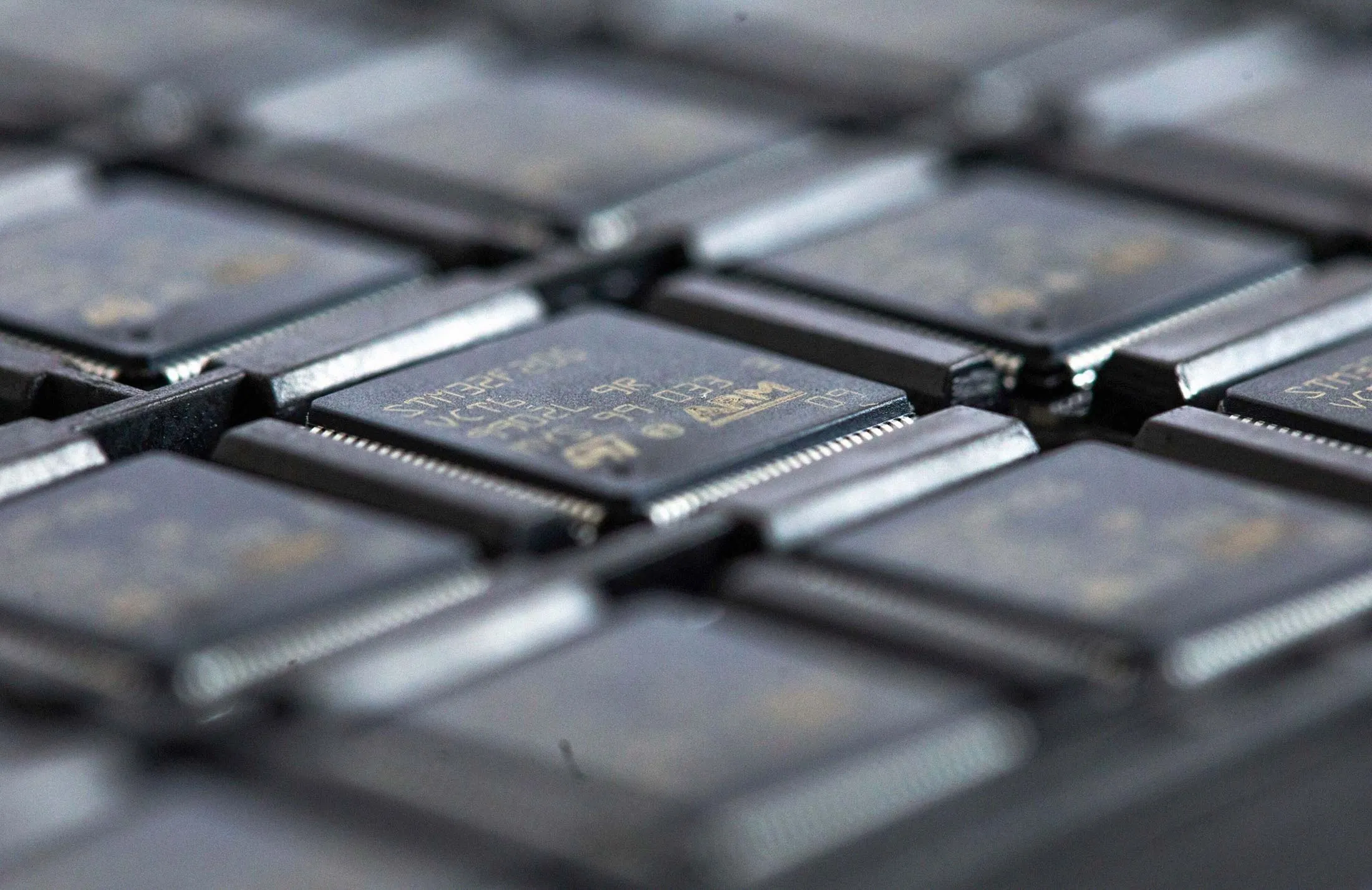 STMicroelectronics integrated circuit microchips, designed using Arm&nbsp;technology.&nbsp;