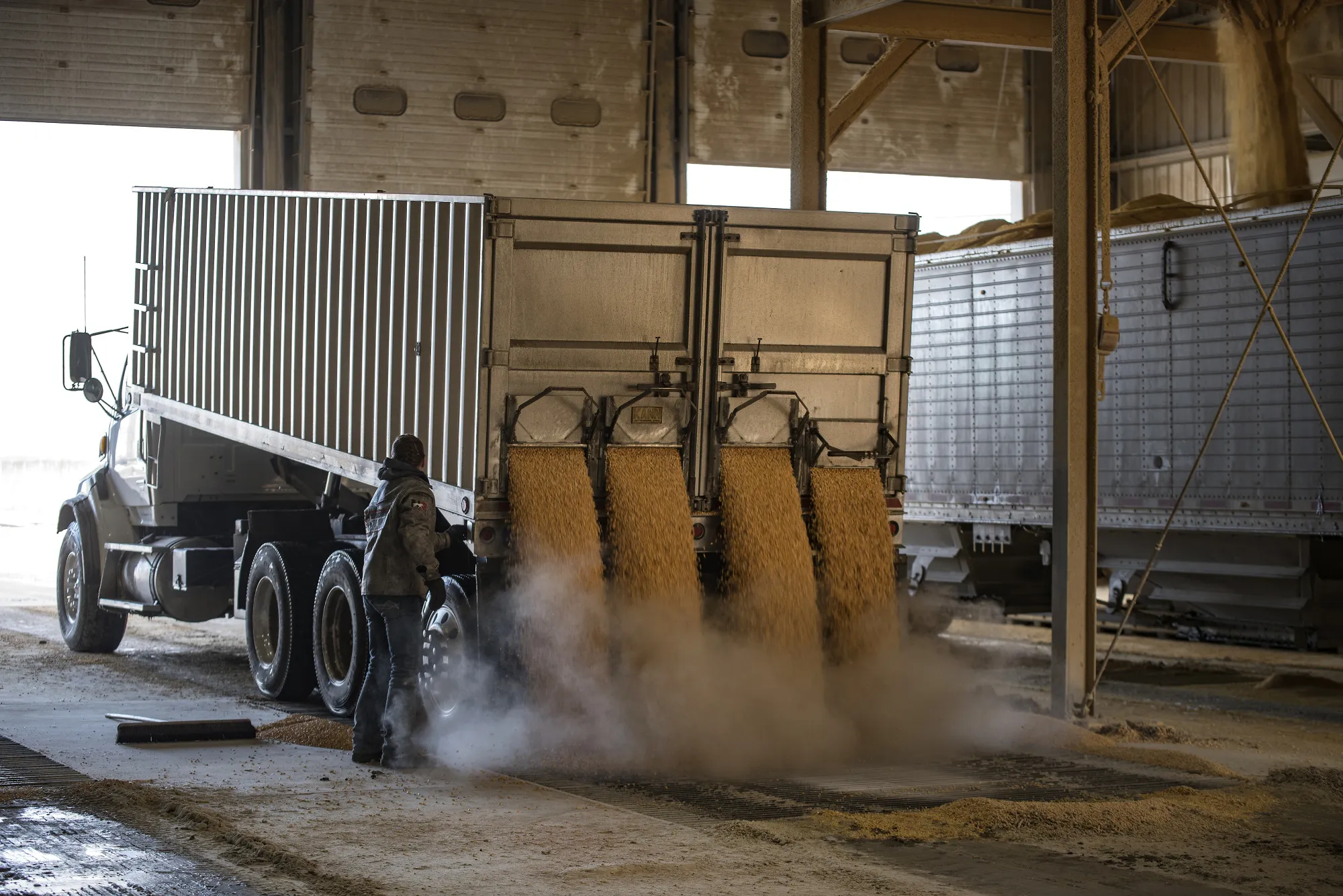 A driver unloads corn at the Poet Biorefining facility in Jewell, Iowa.