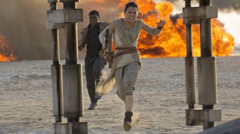 John Boyega as Finn and Daisy Ridley as Rey