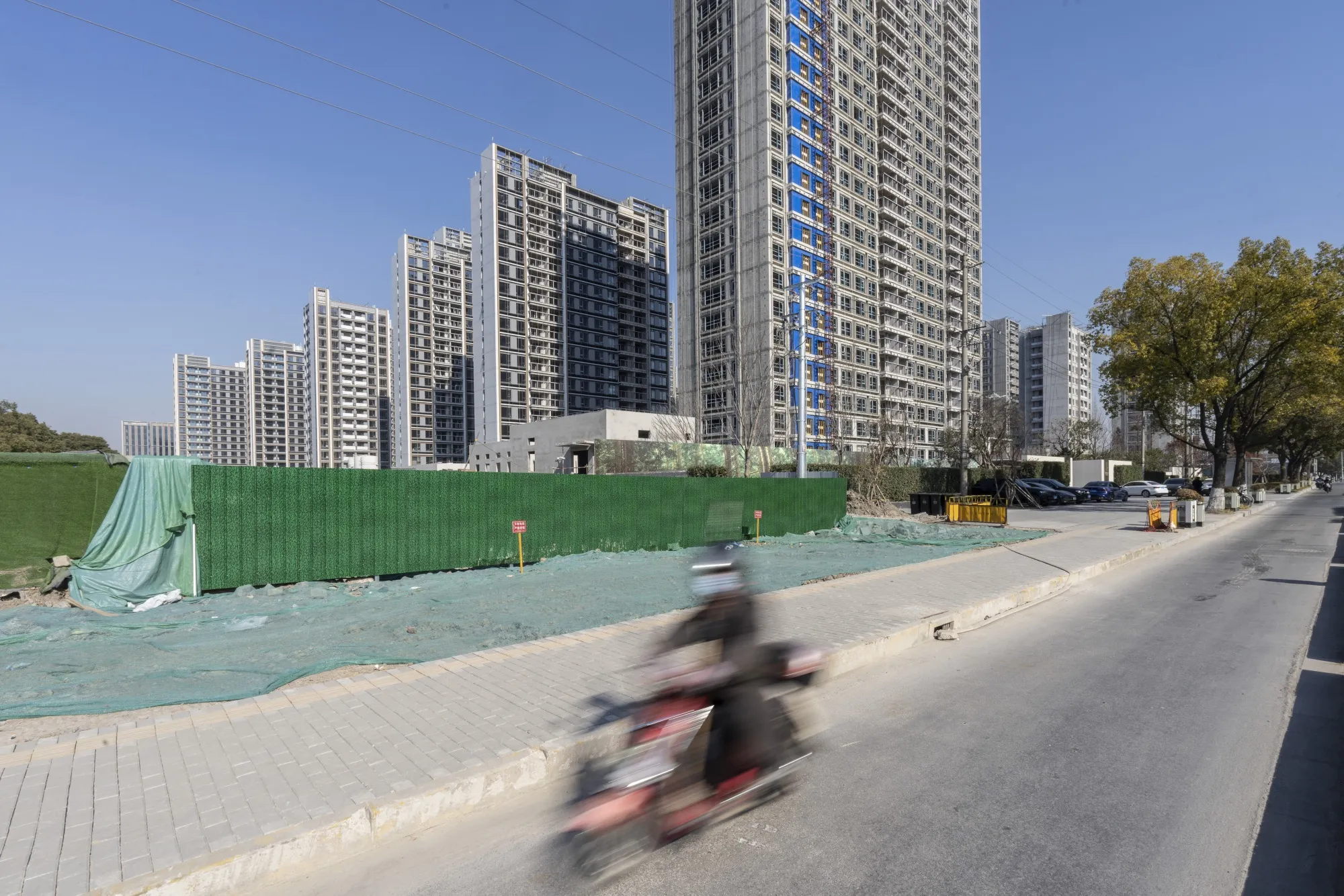 Residential buildings under construction at the China Vanke Co. Isle Maison development in Shanghai, China.