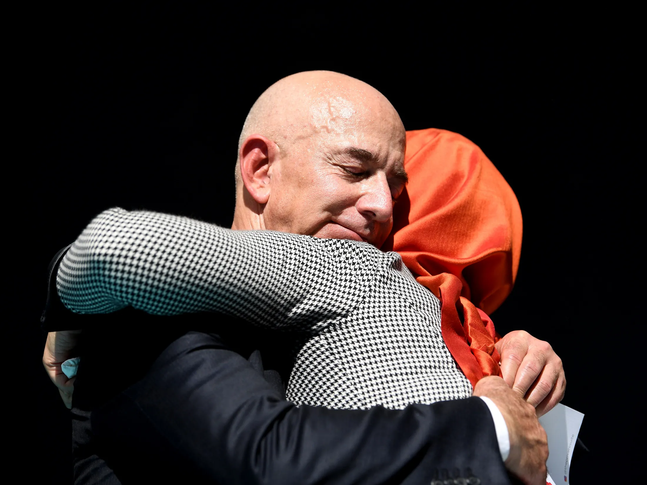 Hatice Cengiz and Jeff Bezos embrace outside the Saudi Consulate in Istanbul, on Oct. 2.