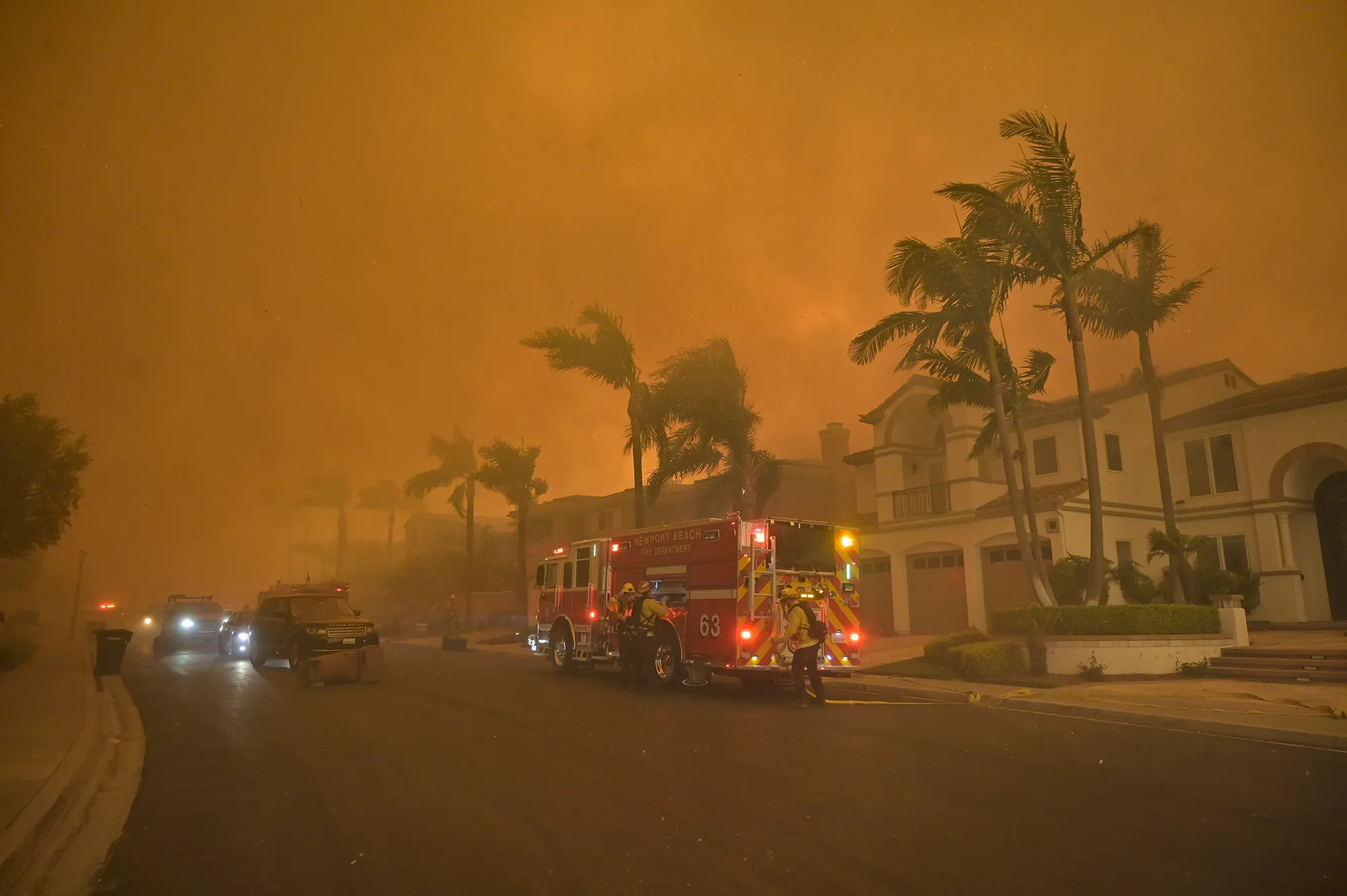 Firefighters battle the Coastal Fire in Laguna Niguel, California, on May 11.