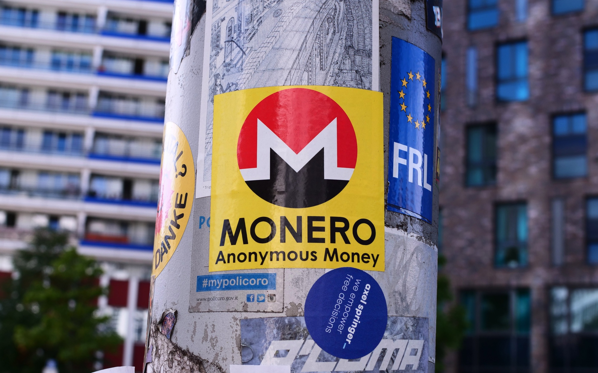 A sticker advertises "Monero," a blockchain-based cryptocurrency in Berlin on Aug. 21, 2022. Monero assures users a relatively high degree of anonymity and relies on encrypted amounts, making it difficult for outsiders to track money movements Photographer: Wolfram Steinberg/picture alliance/Getty Images