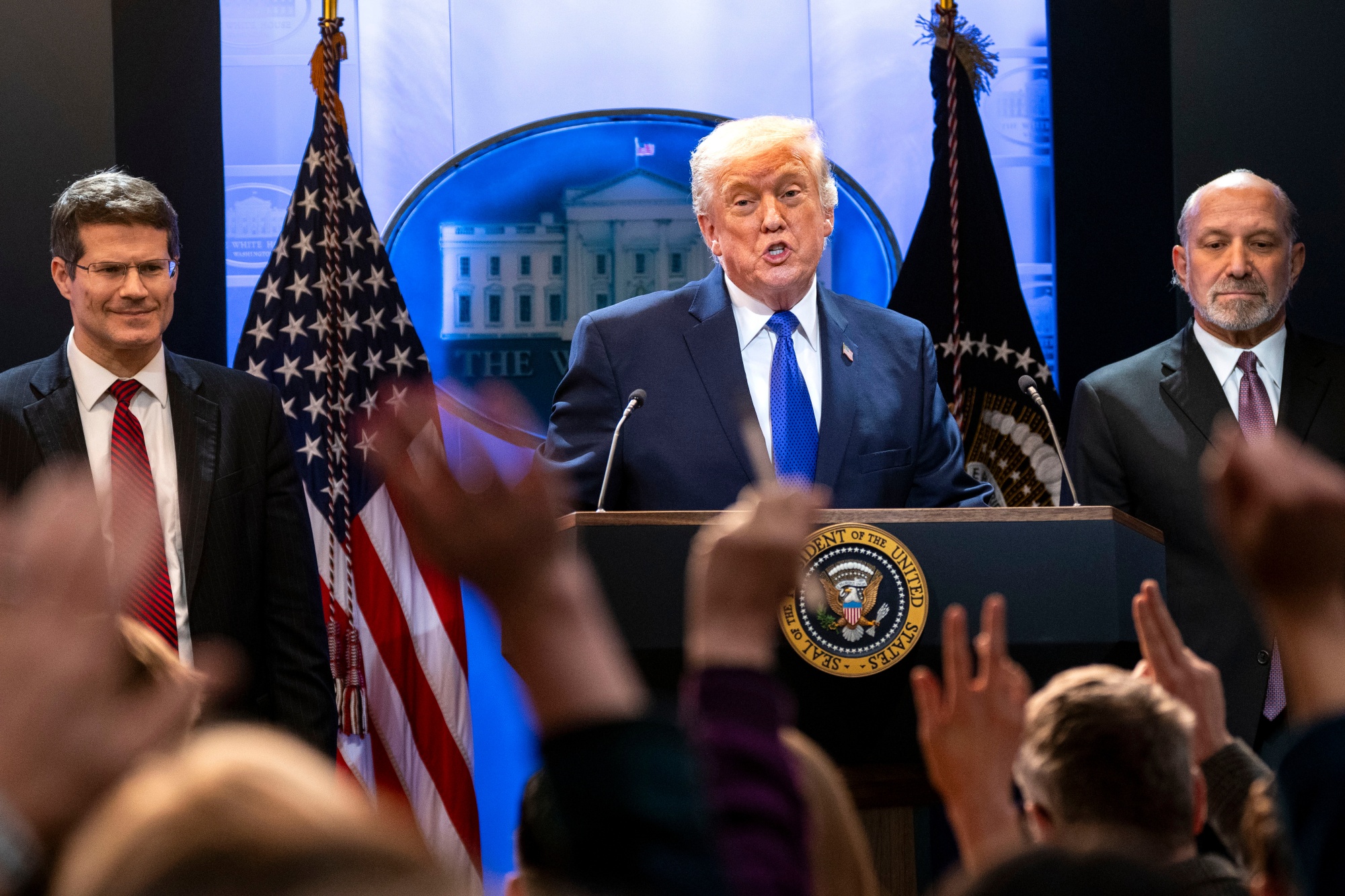 US President Donald Trump, Howard Lutnick, US commerce secretary, right, and John Sauer, on Feb. 20. Photographer: Bonnie Cash/UPI
