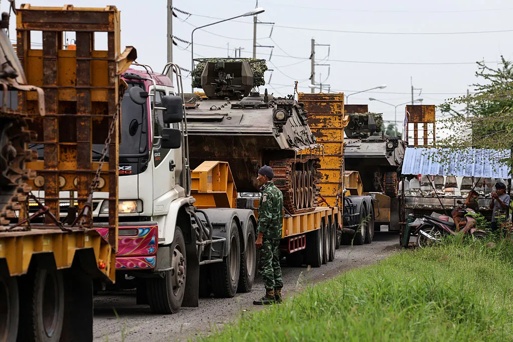 Trucks transporting Chinese-produced type 85 Armored Fighting Vehicles in Surin, Thailand, July 26.