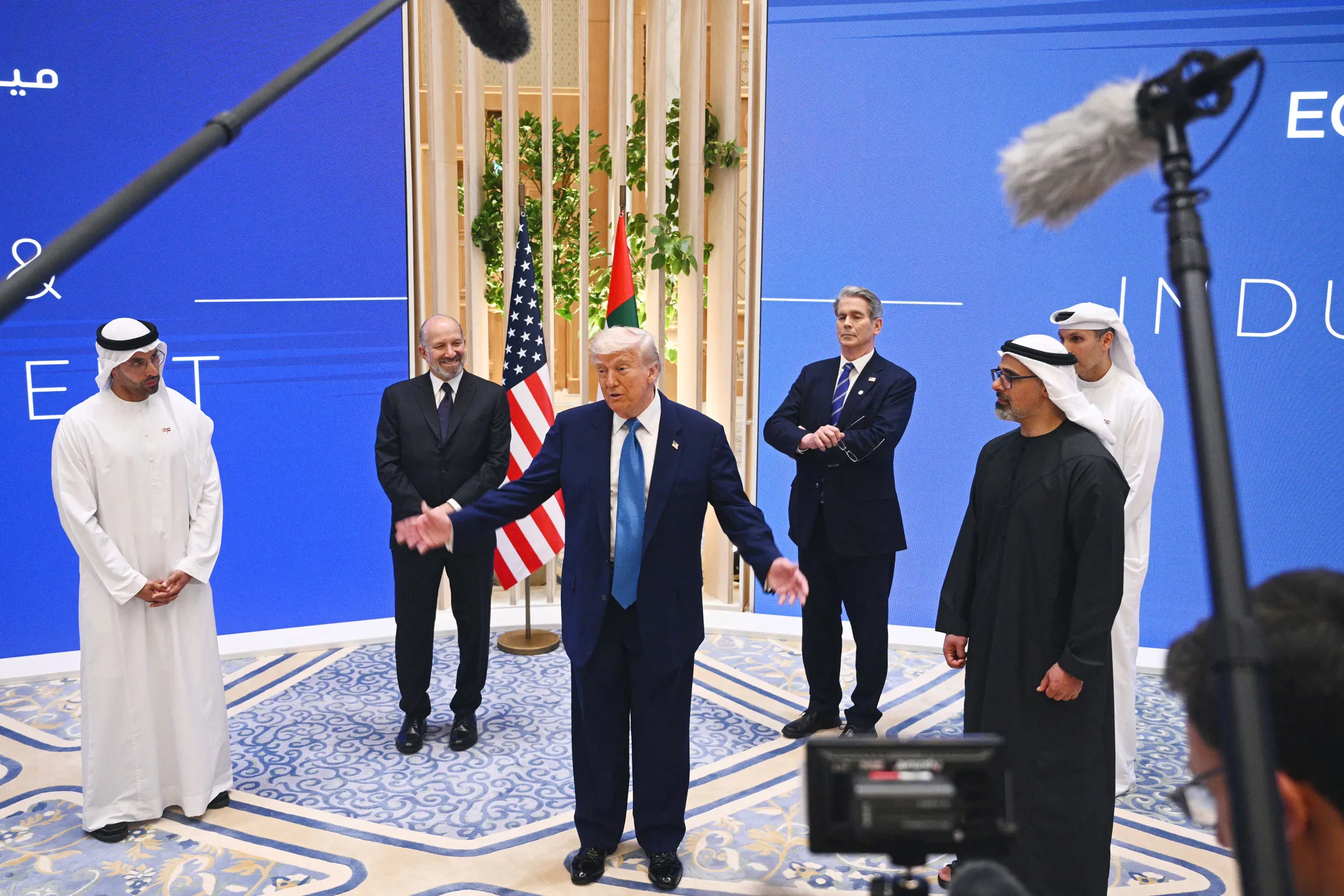 President Donald Trump, center, speaks during the US-UAE Investment Forum in Abu Dhabi on May 16.