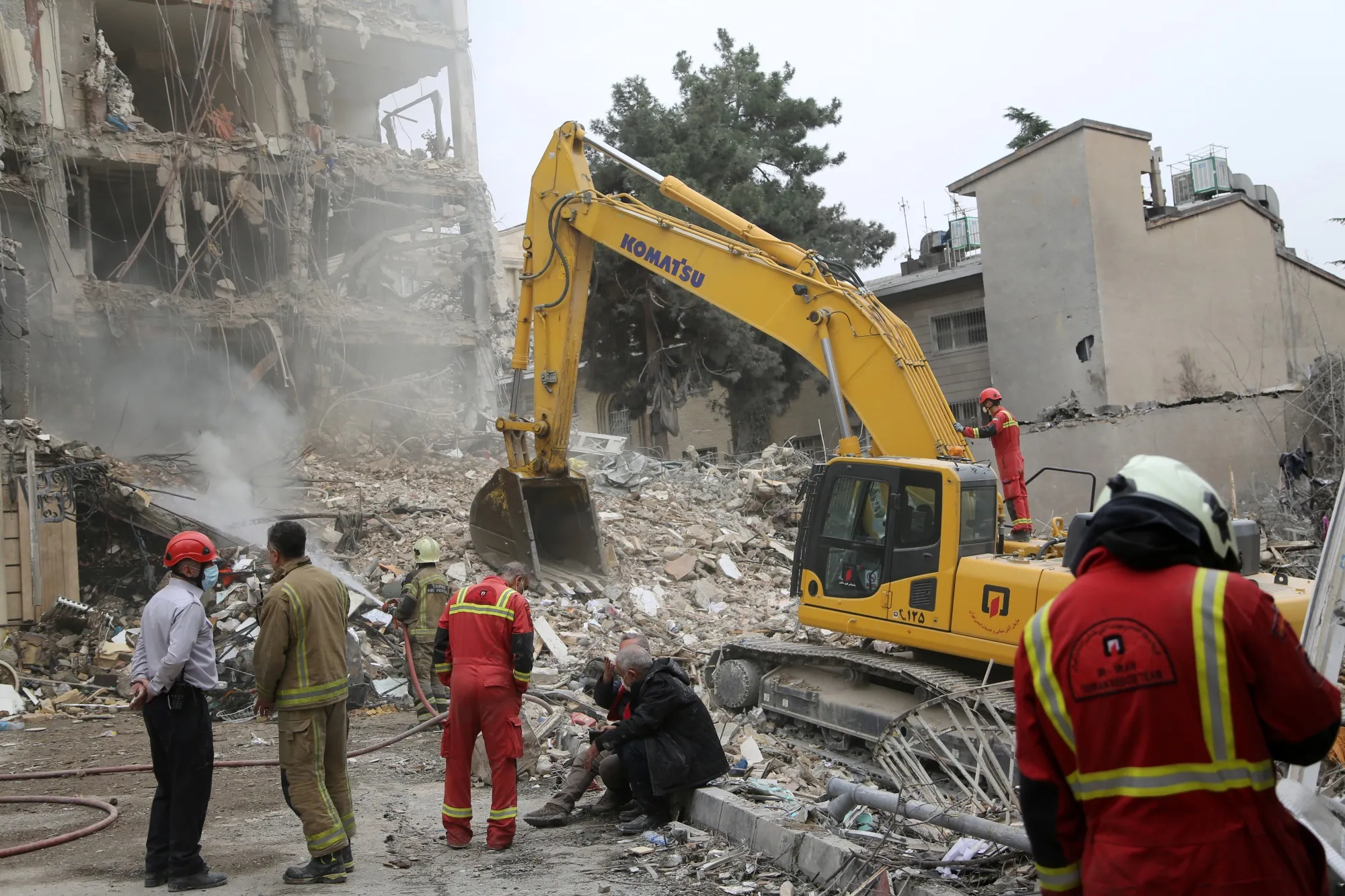 Civil defense and search and rescue teams continue operations in the area after US&nbsp;and Israeli strikes hit Tehran, on March 23.
