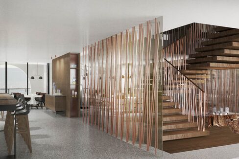 The floating, copper-encased stairwell in the lobby.
