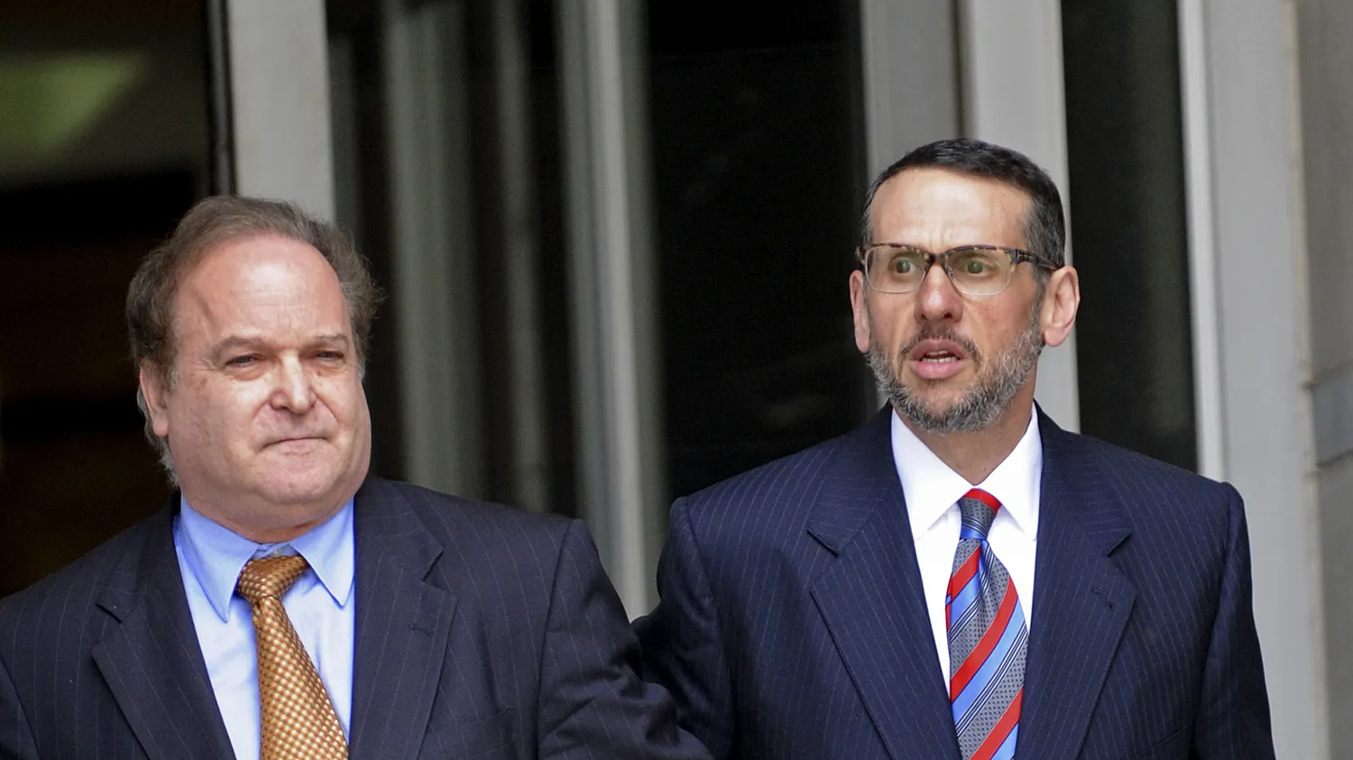 David Wildstein, a former ally of New Jersey Governor Chris Christie, right, exits federal court with his lawyer Alan Zegas, left, in Newark, New Jersey, U.S., on Friday, May 1, 2015. Wildstein pleaded guilty to conspiring to create traffic jams near the George Washington Bridge to punish a local mayor.
