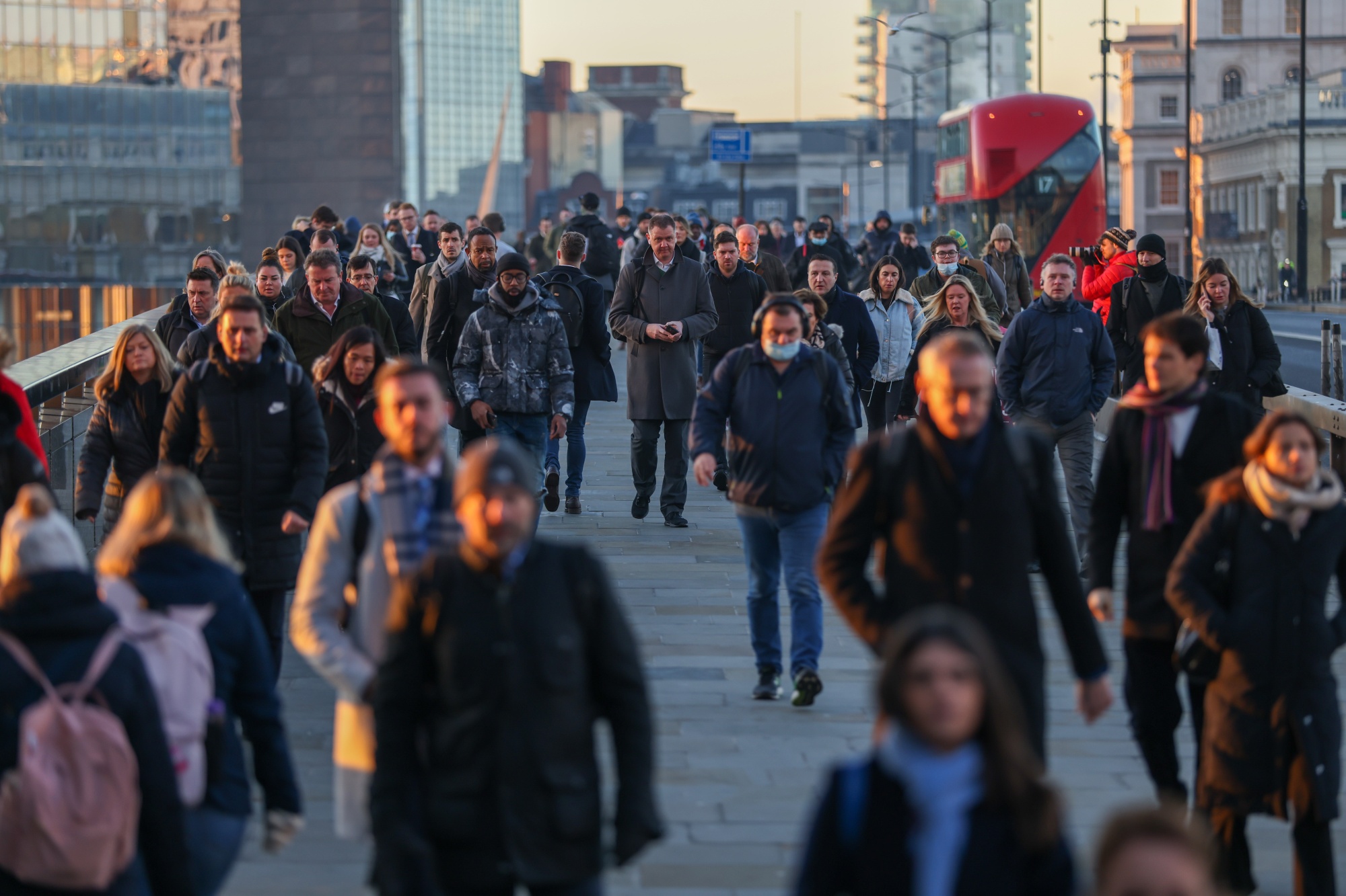 Morning commuters on London Bridge. Photographer: Hollie Adams/Bloomberg