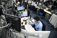 Inside Trading Room of Mitsubishi UFJ Trust & Banking As BOJ Announces Rate Change 