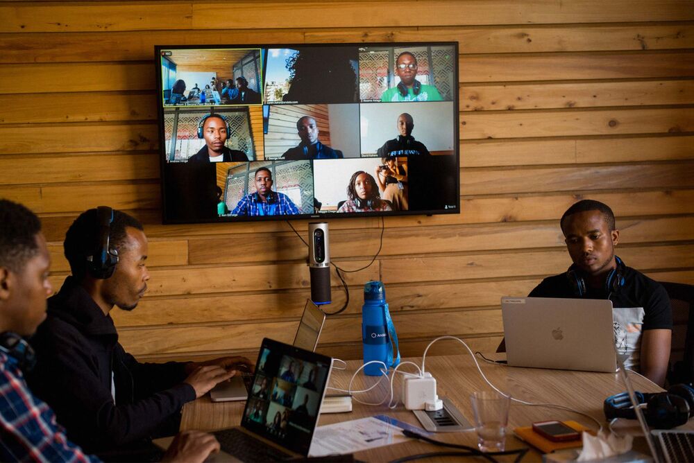 Software developers videoconferencing at the Nairobi, Kenya,Â officeÂ of Andela.