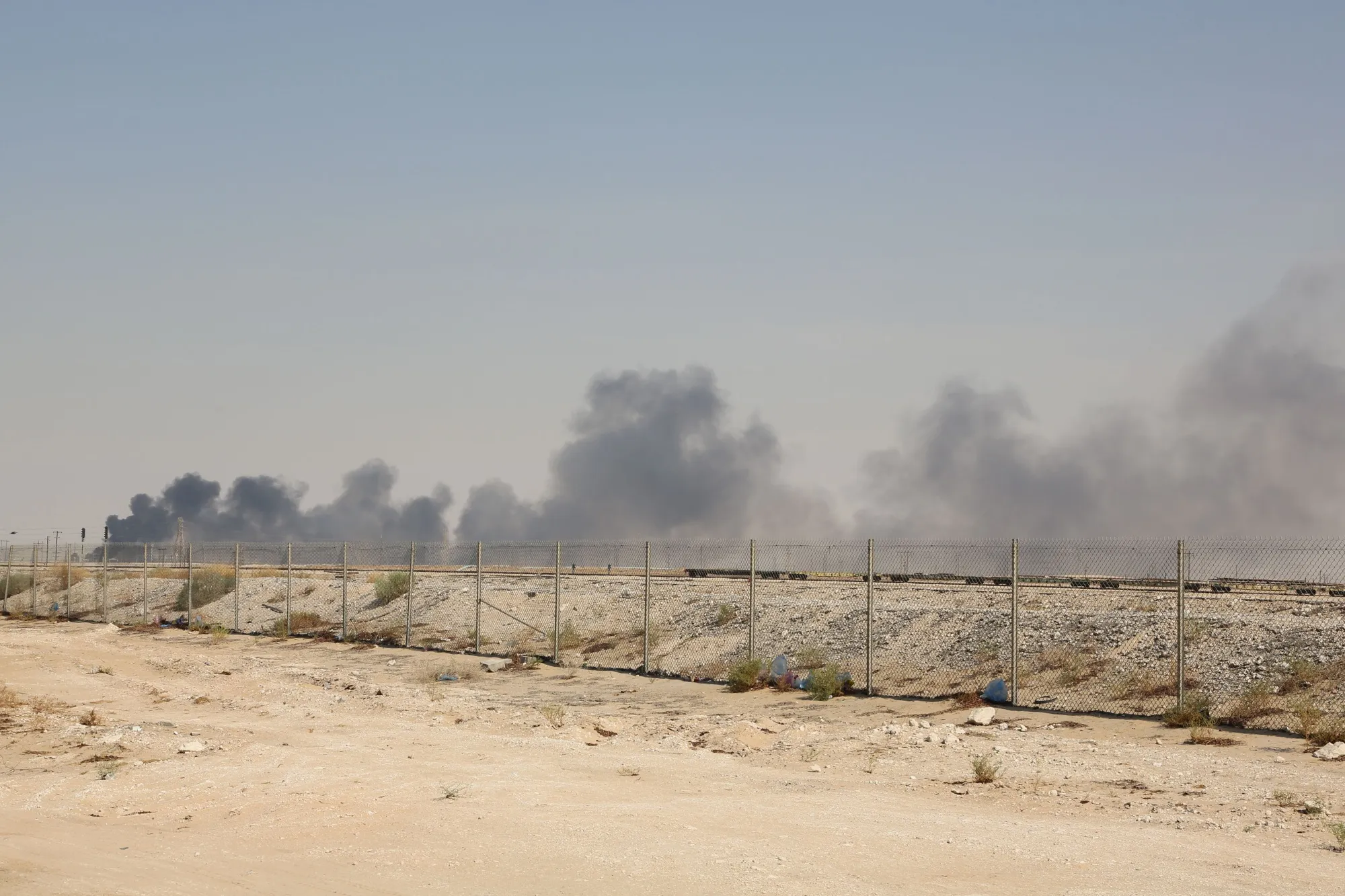 Smoke billows from an Aramco oil facility in Abqaiq on Sept. 14.