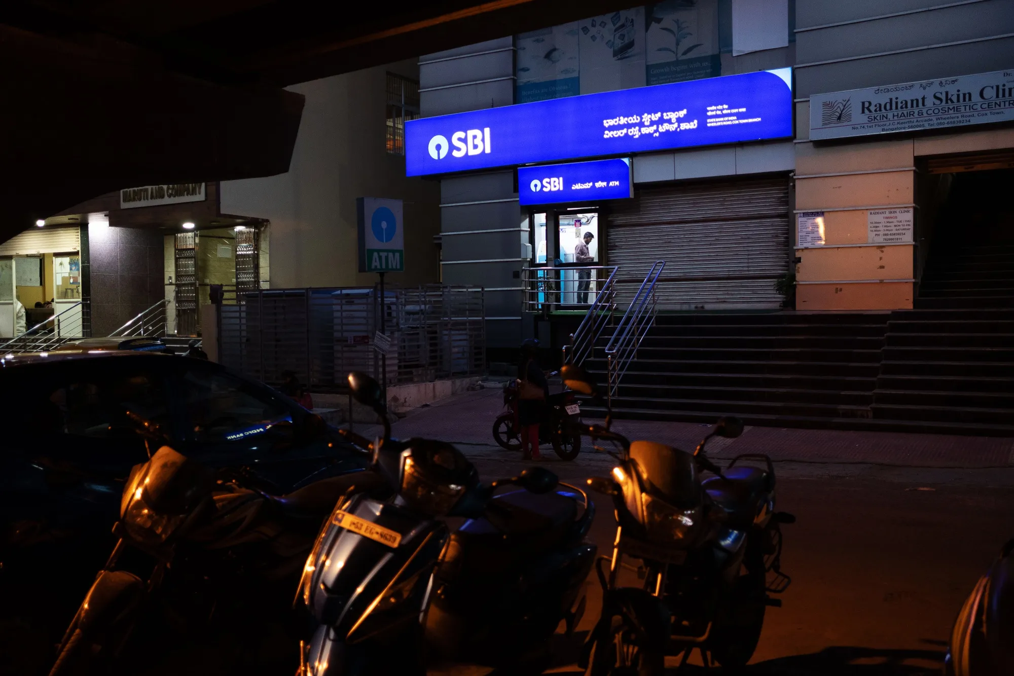 A customer uses an automated teller machine at a State Bank of India Ltd.&nbsp;branch&nbsp;in Bengaluru, India.&nbsp;