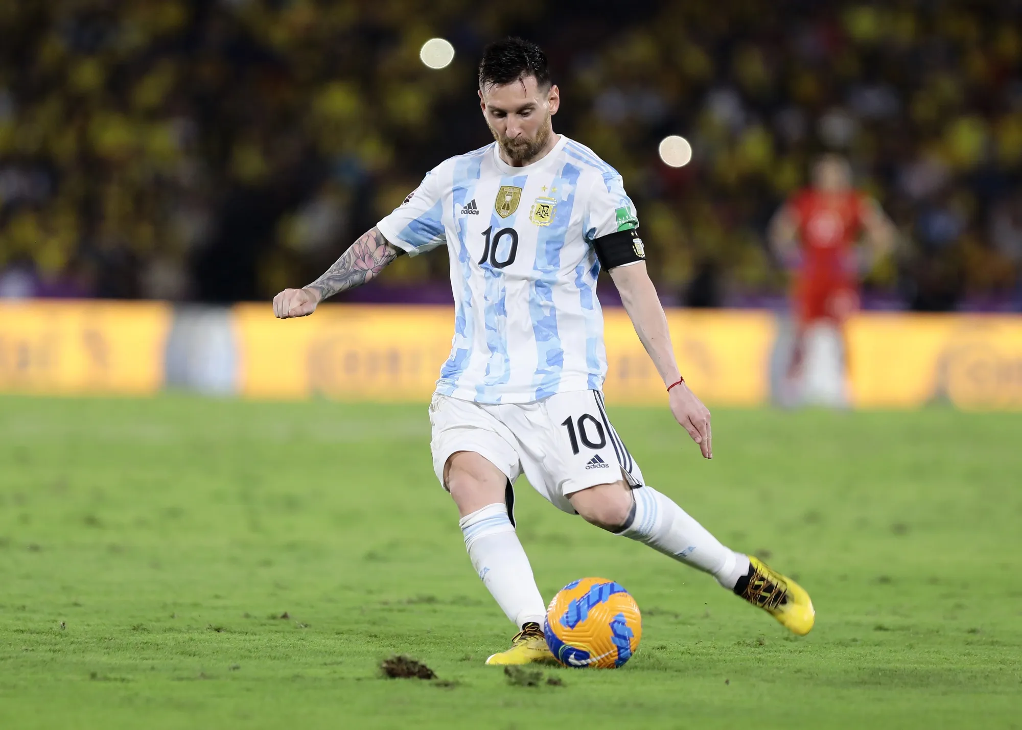 Argentina's Lionel Messi controls the ball during a qualifying soccer match against Ecuador for the FIFA World Cup Qatar 2022 at Monumental Banco Pichincha stadium in Guayaquil, Ecuador, Tuesday, March 29, 2022. (Franklin Jacome/Pool via AP)