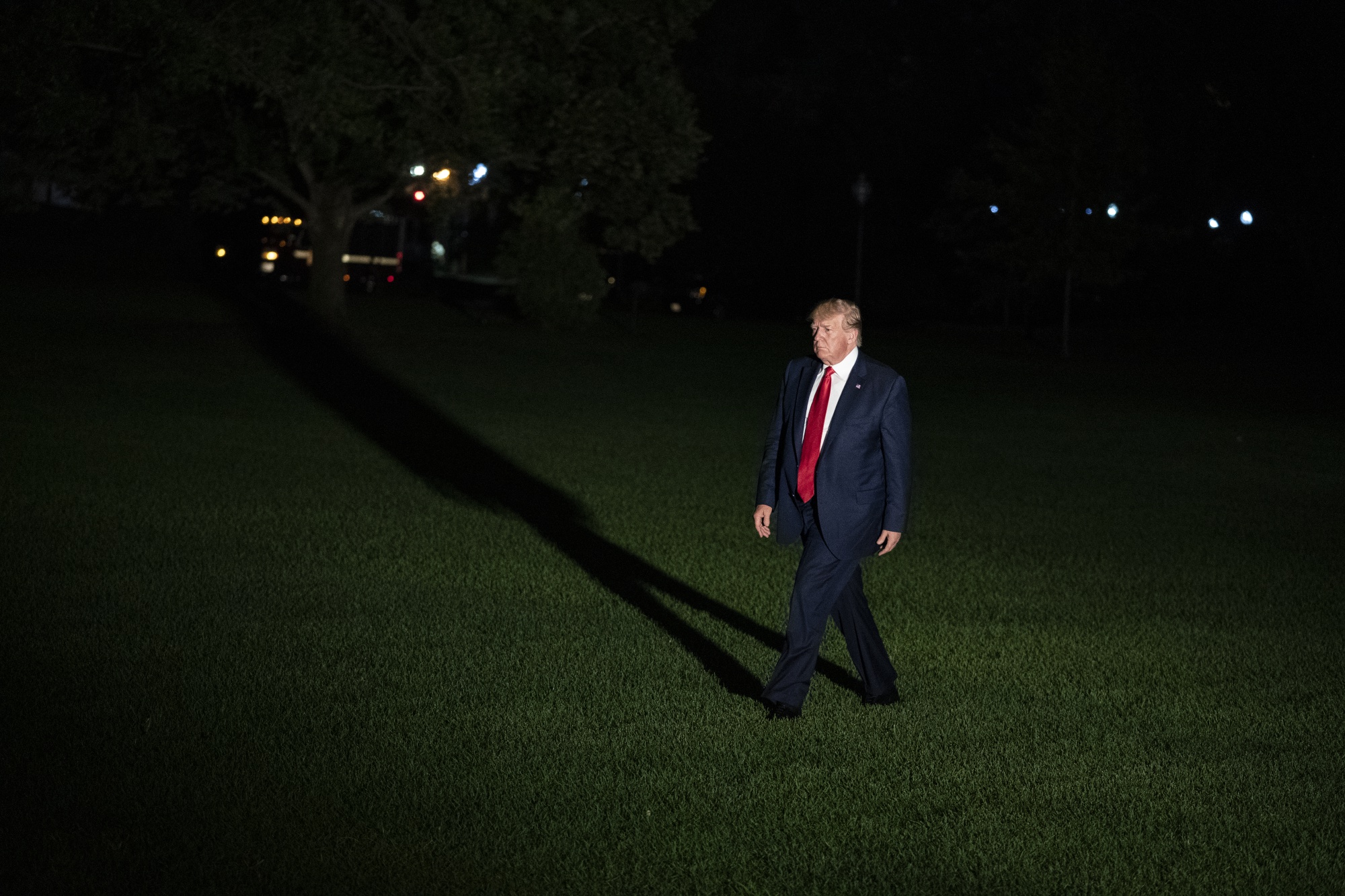 Trump walks across the South Lawn of the White House after arriving on Marine One in Washington, D.C. on July 12, 2019.