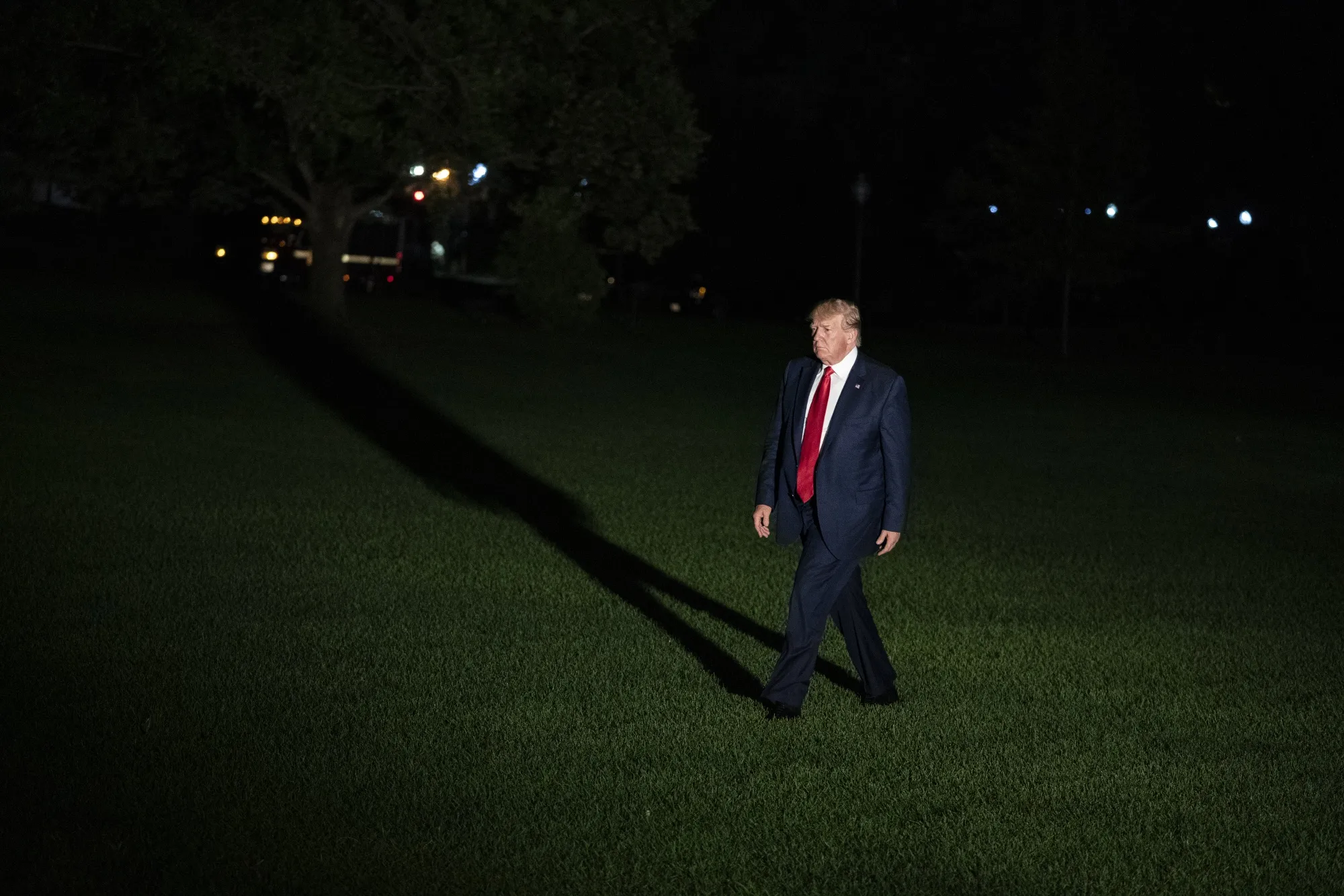 Trump walks across the South Lawn of the White House after arriving on Marine One in Washington, D.C. on July 12, 2019.