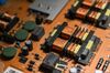 Delta Electronics Inc. components are displayed on a power supply circuit board on display in a showroom at the company's headquarters in Taipei, Taiwan, on Friday, May 3, 2019.