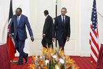 Kenya's President Uhuru Kenyatta and U.S. President Barack Obama meet in 2015. Something in common?