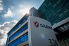 Signage is displayed outside Gilead Sciences Inc. headquarters in Foster City, California, U.S., on Thursday, March 19, 2020. Gilead Sciences stock jumped as much as 7% on Thursday, reaching a two-year high, as a Piper Sandler analyst doubled down on his call on the approval prospects for the biotech company's experimental therapy for the pandemic now sweeping the U.S.