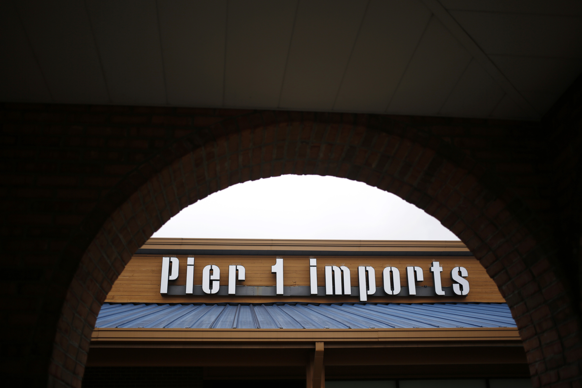 Signage is displayed outside a Pier 1 Imports Inc. retail store in Louisville, Kentucky.