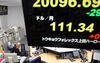 Dealers At A Foreign Exchange Brokerage As Yen Extends Advance Against The Dollar