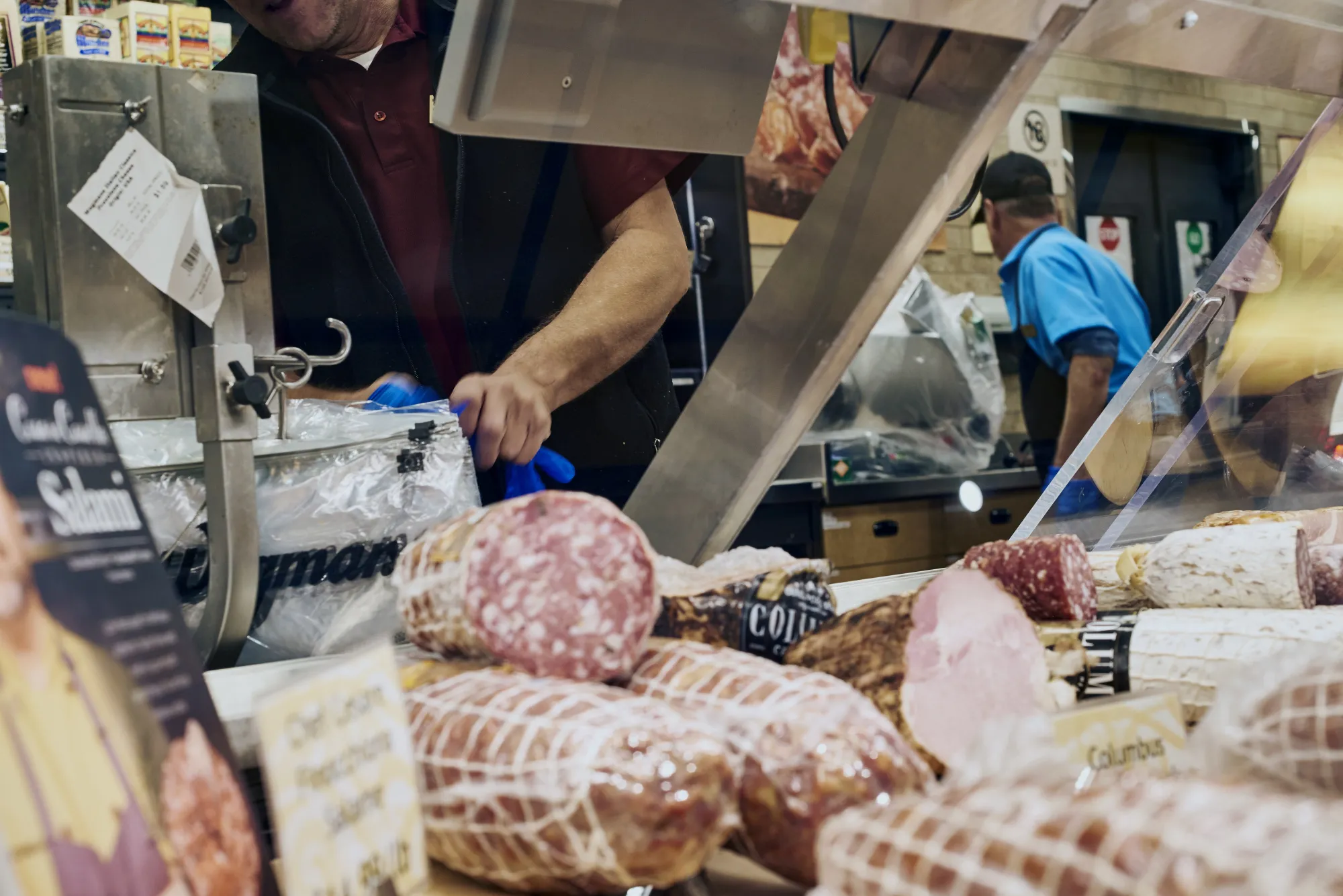 An employee prepares deli meat in Montvale, New Jersey.